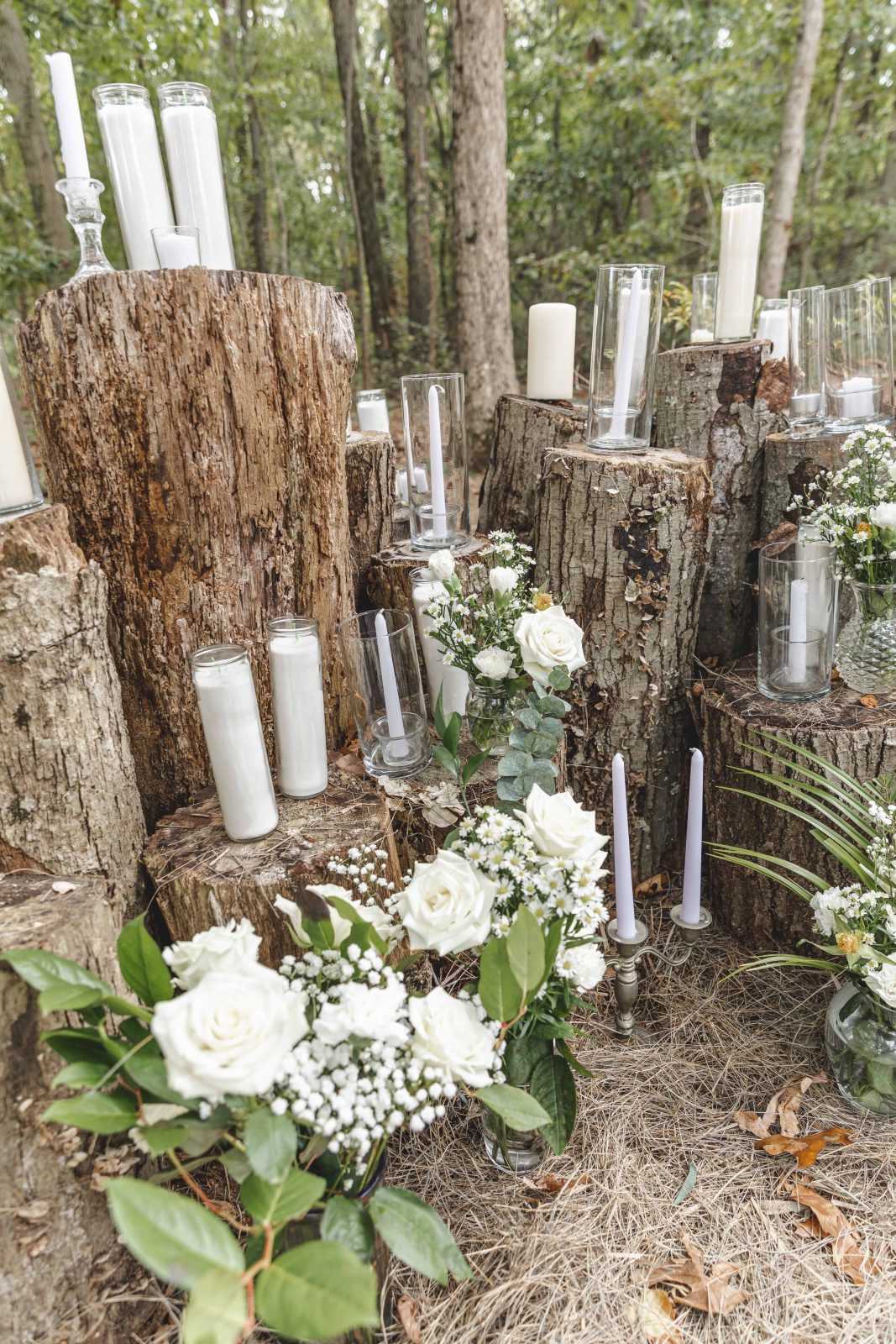 outdoor candles on logs