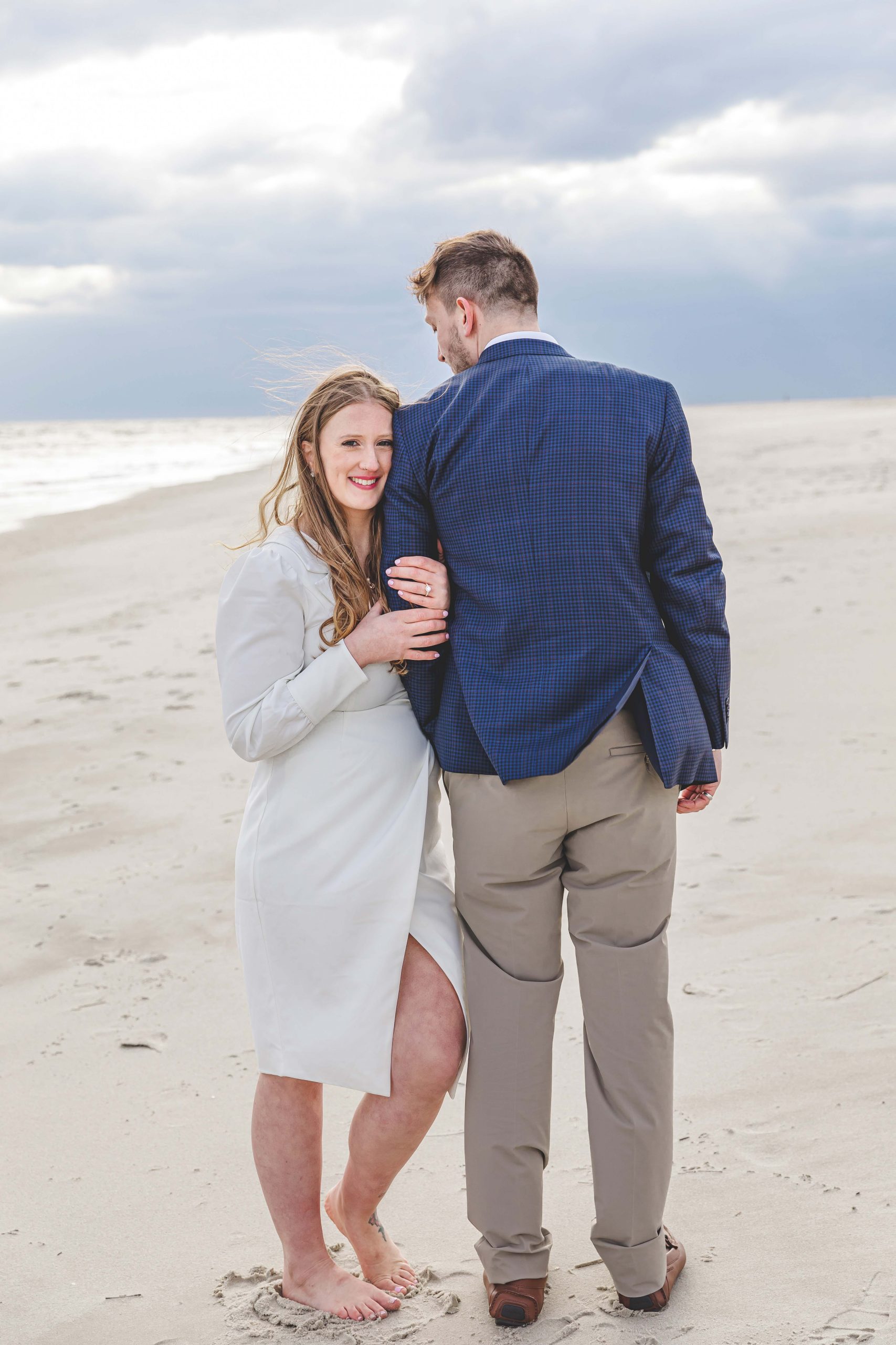 engagement on beach in cape may