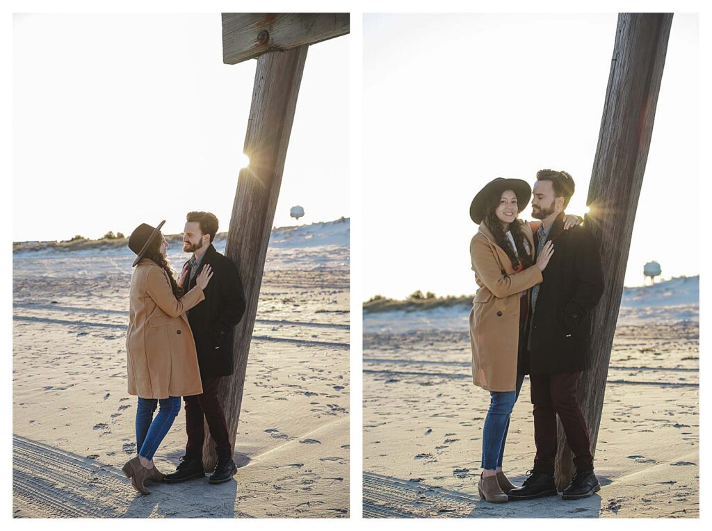 couple leaning on avalon pier