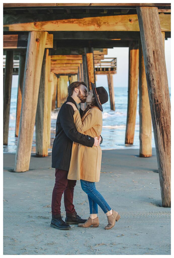 couple kissing Avalon Beach Engagement Session