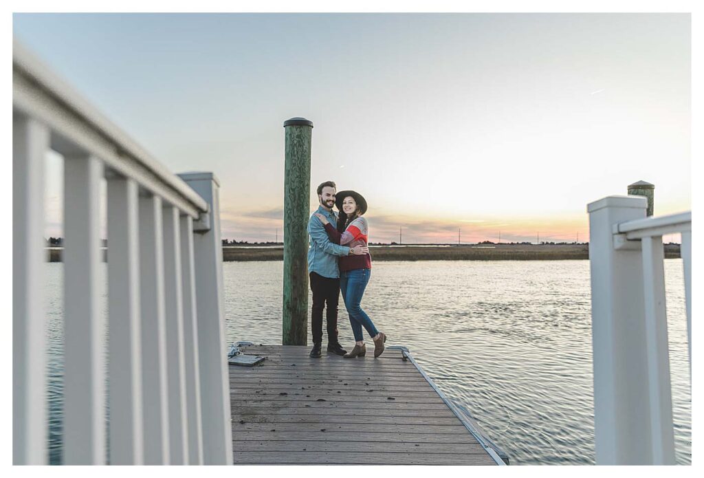 sunset and couple on dock