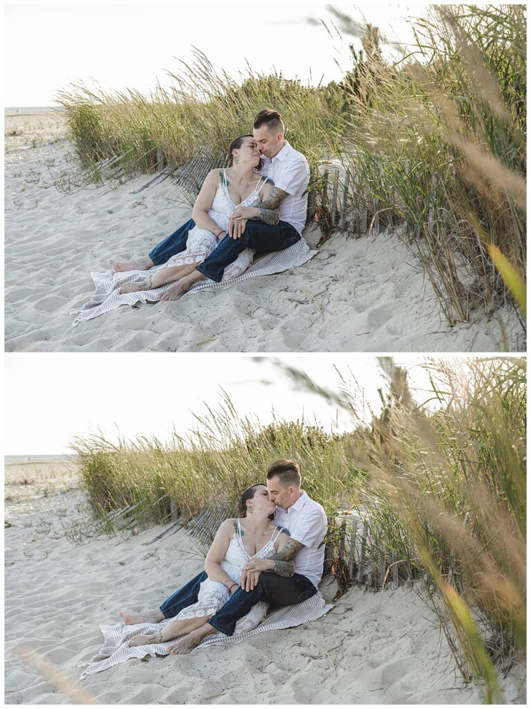 couple sitting in sand cape may engagement session