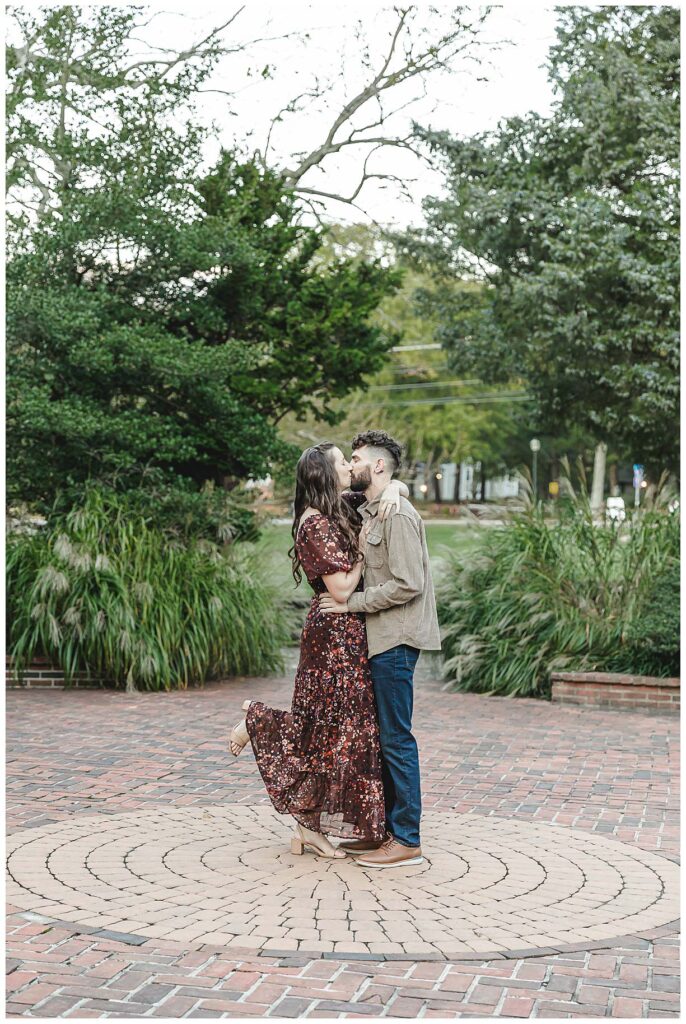 couple kissing during engagement session at smithville