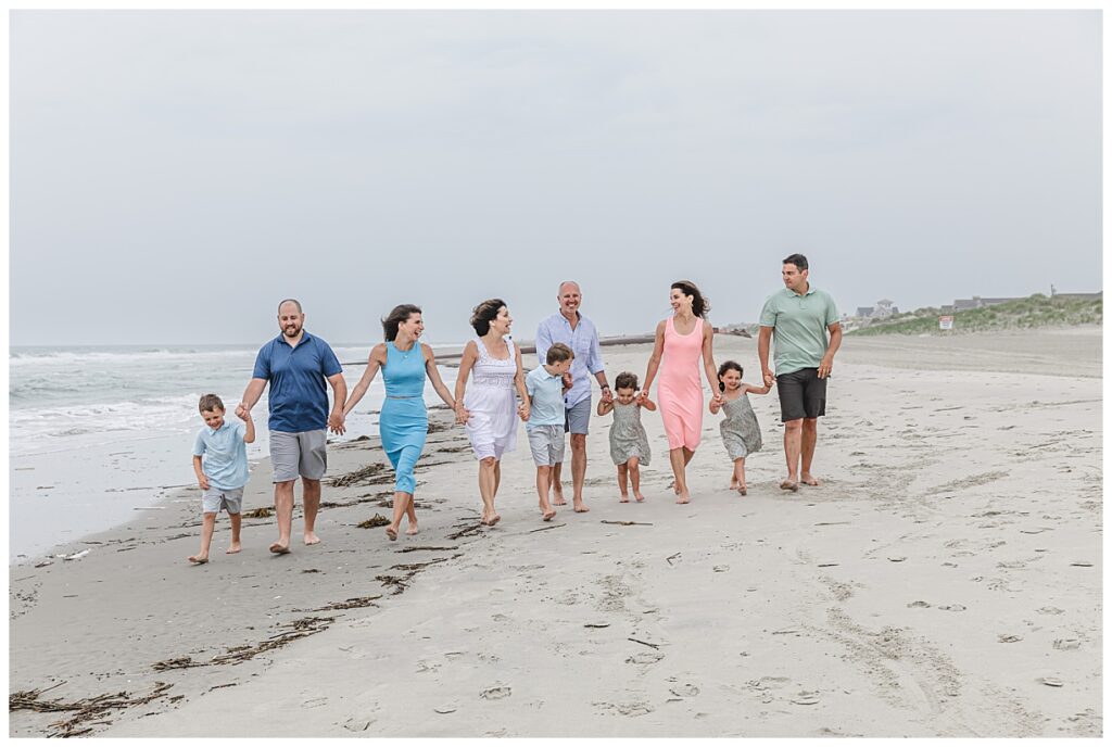 family walking on beach in Sea Isle Nj