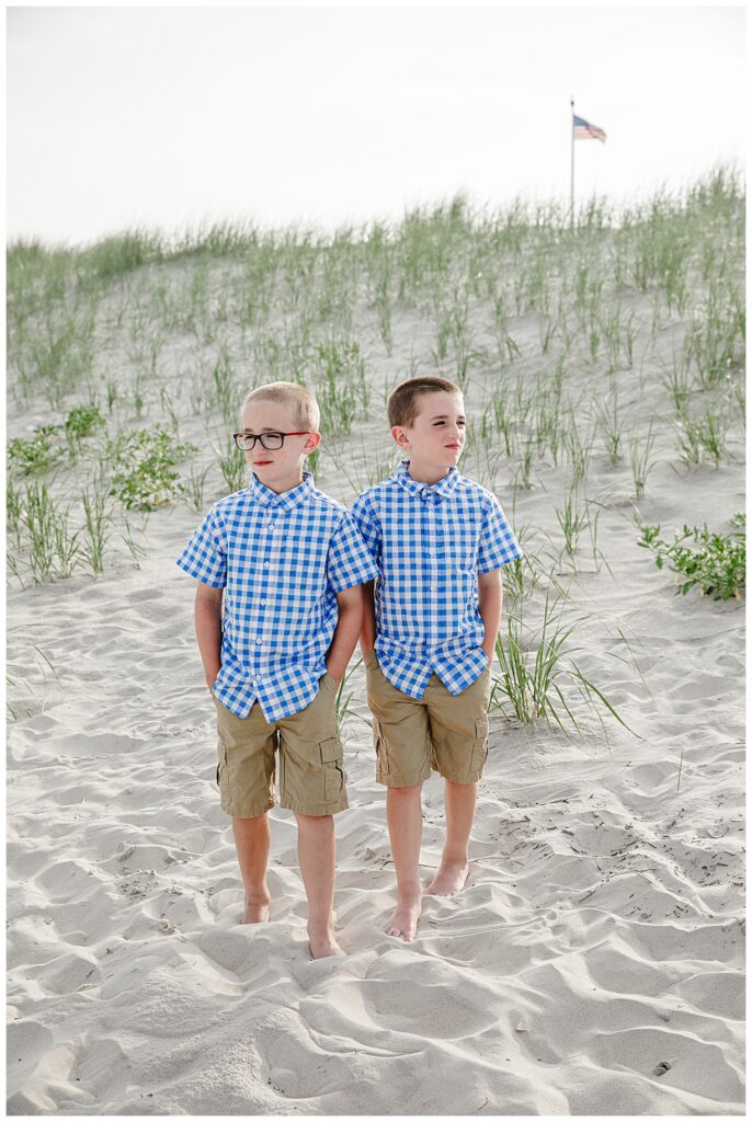 Twin boys standing on beach in Ocean city Nj