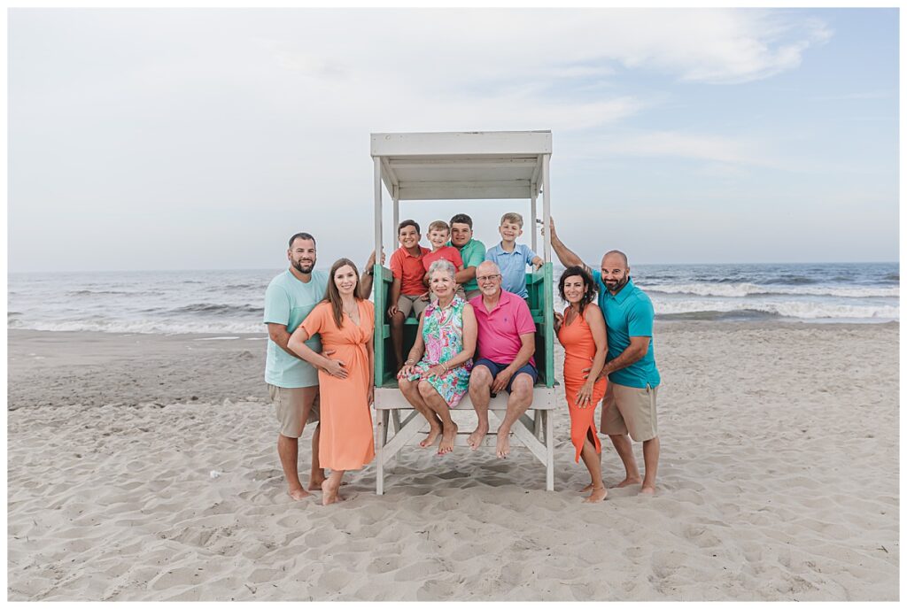 A family wearing colorful outfits on the beach in Ocean City NJ for their family session