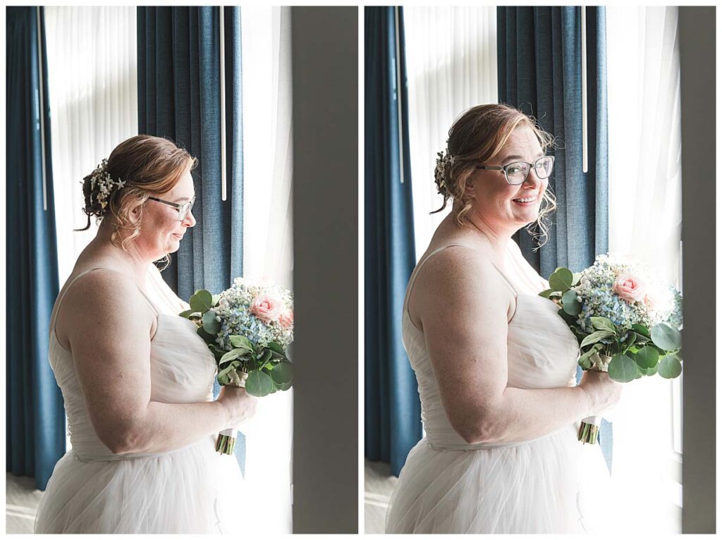 bride standing by window on wedding day at hotel LBI