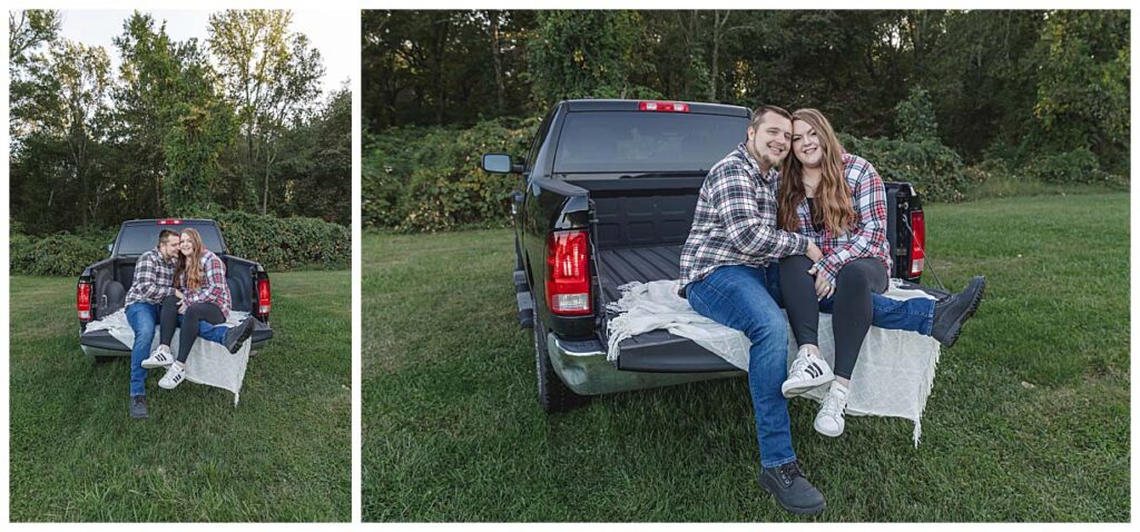 cpuple sitting in pickup truck posing for engagement pictures