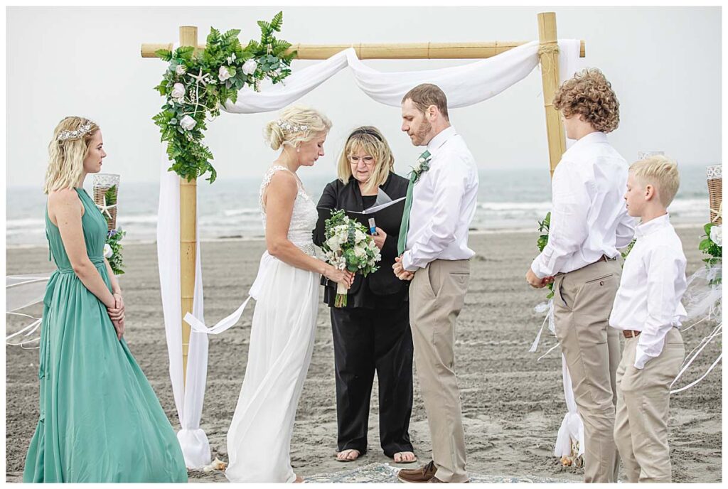 wedding couple getting married on beach in north wildwood nj