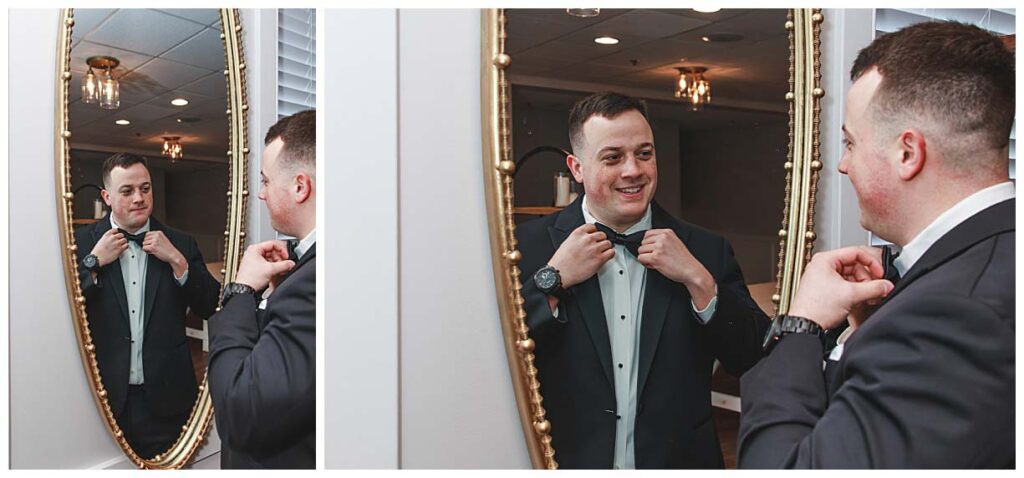 groom looking into a mirror at his wedding