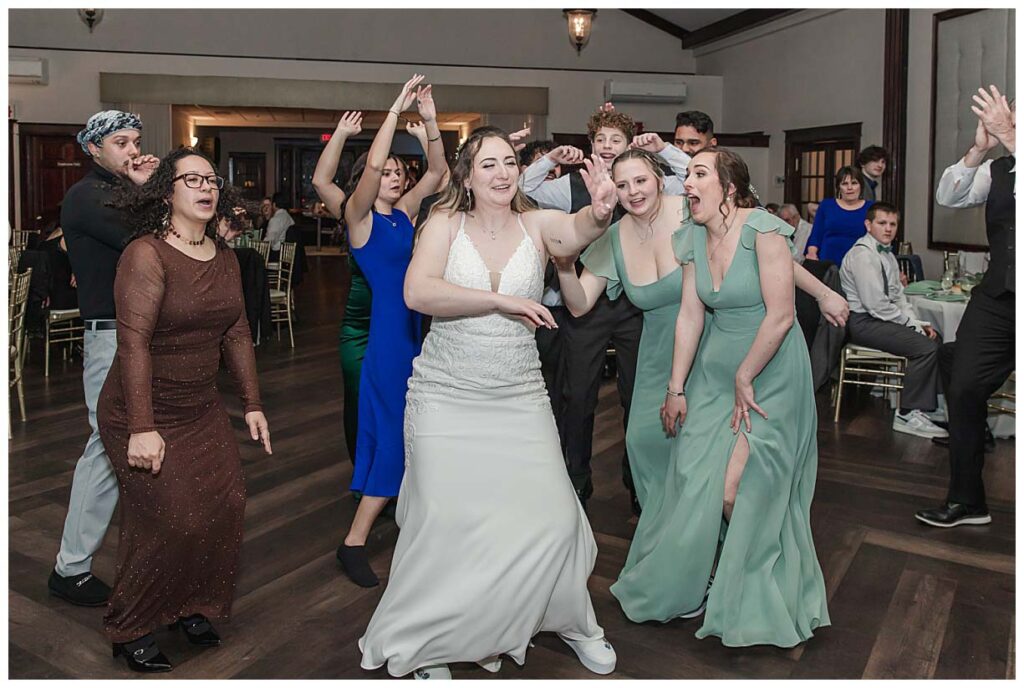 dancing during wedding reception at running deer golf club