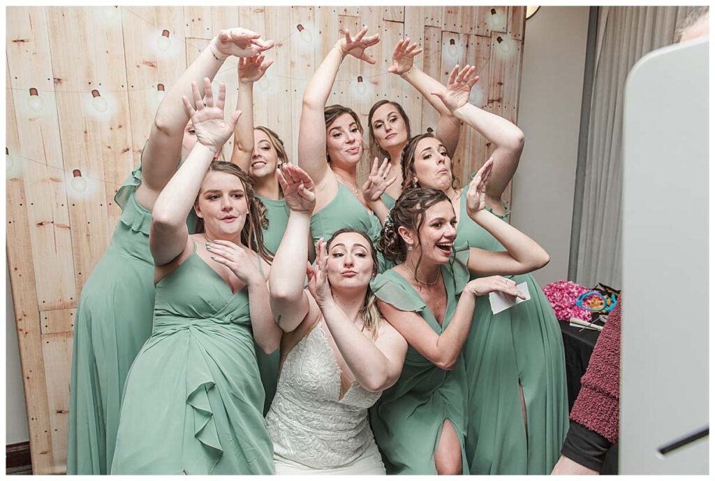bride and bridesmaid in photo booth