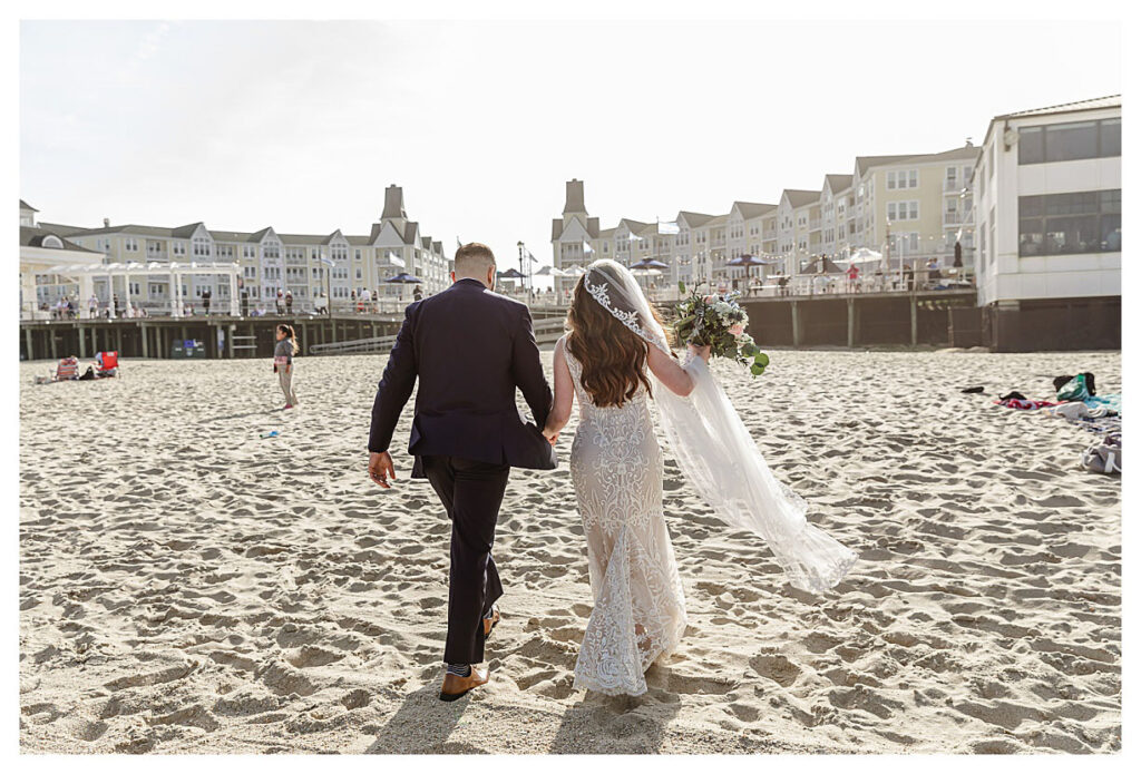 wedding couple walking into the sunset