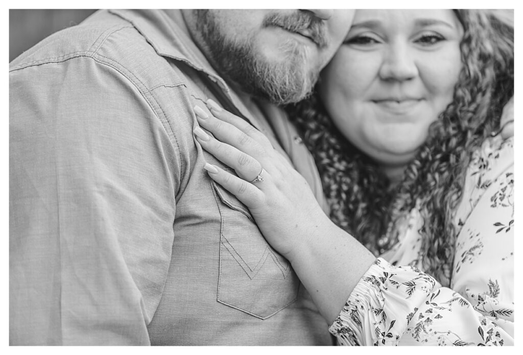 black and while photo of couple smiling