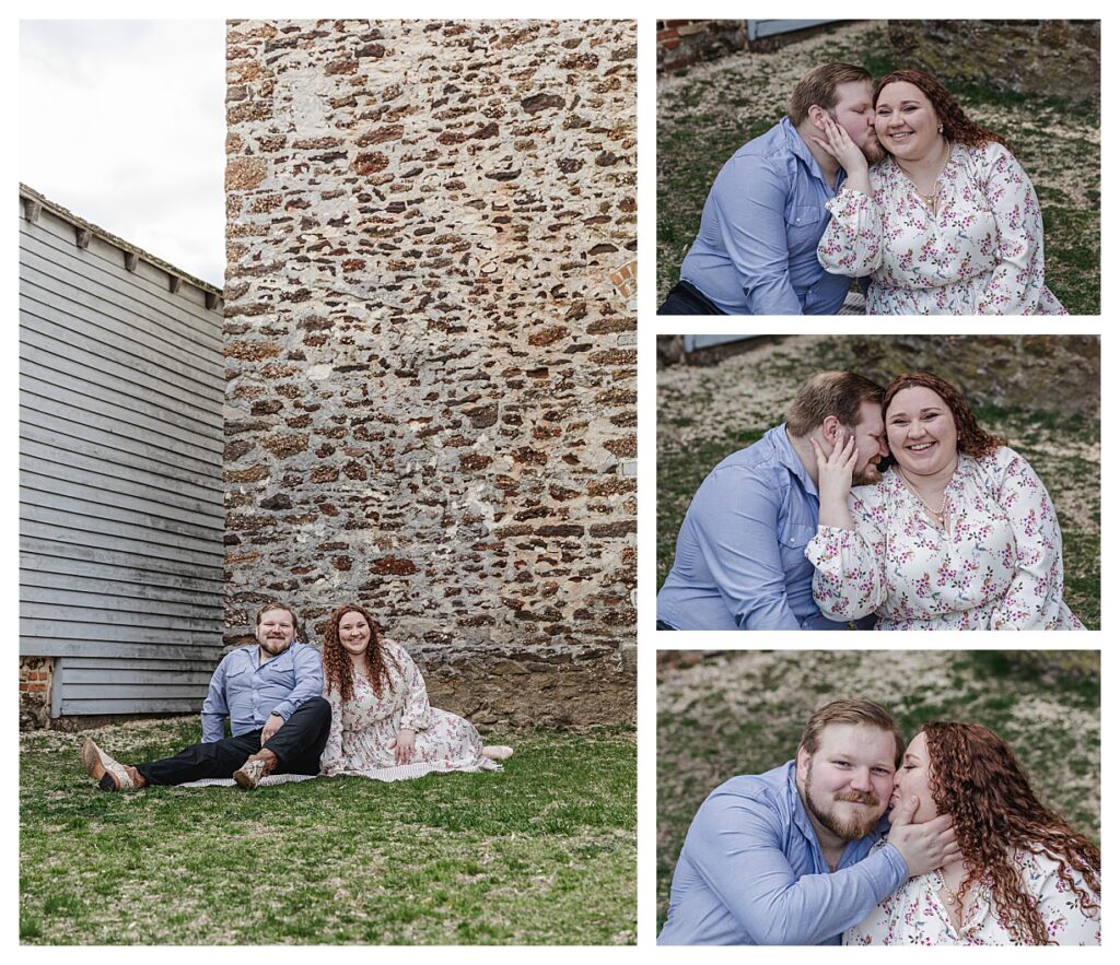 couple sitting near blue door at batsto. hugging and kissing