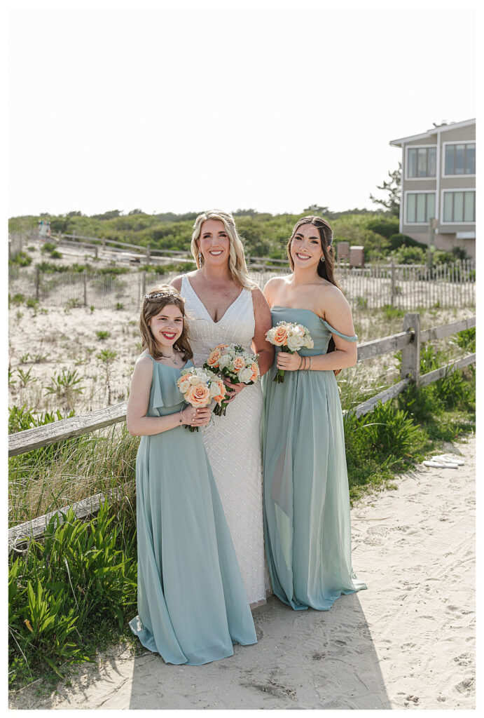 bride and bridesmaids on the beach in Ocean city nj