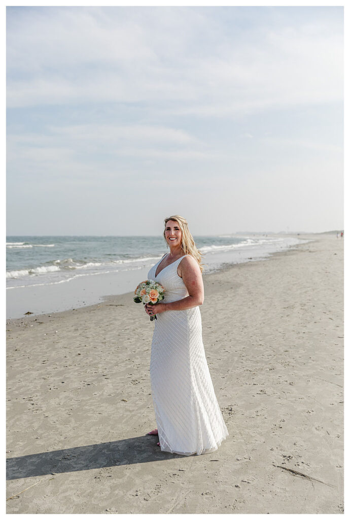 bride on beach before her beach wedding in ocean city nj