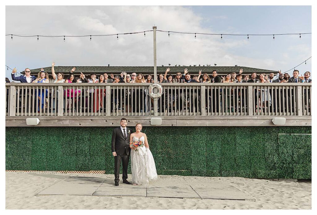 bride and groom with all of their guests at the Deauvill inn