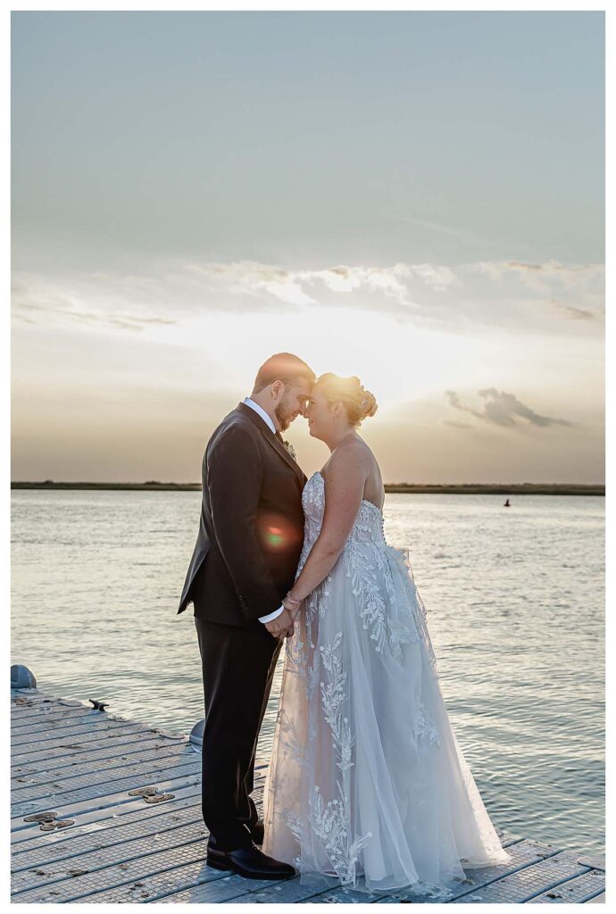 sunset photos at the fall coastal wedding at the deauville inn