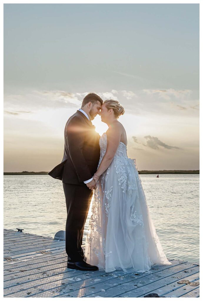 sunset photos at the fall coastal wedding at the deauville inn