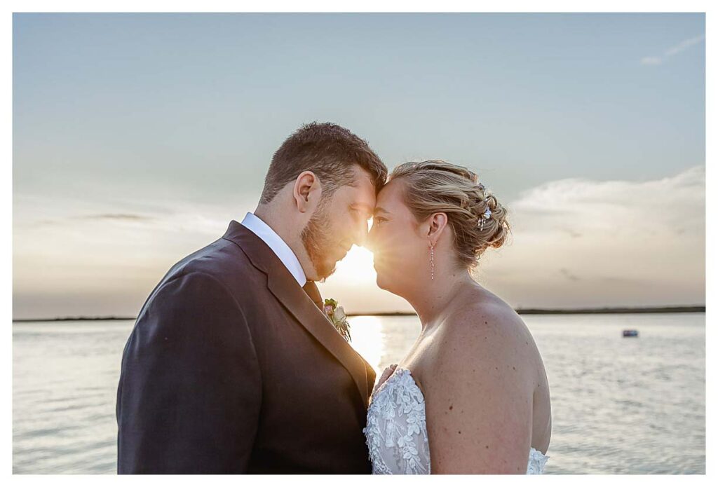 sunset photos at the fall coastal wedding at the deauville inn